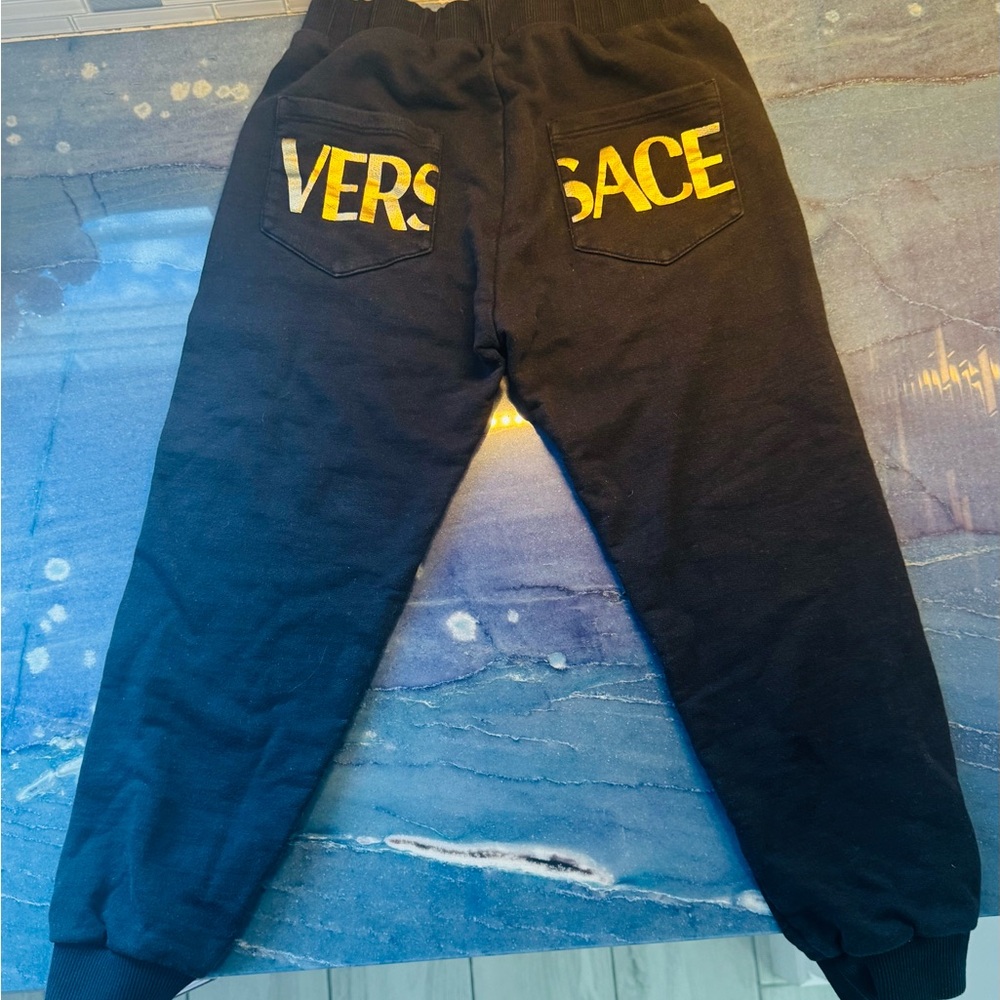 Versace Black Sweatpants with Gold Lettering